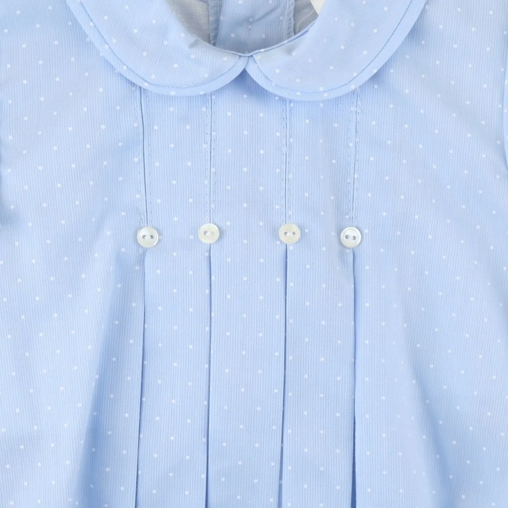 Miniloo light blue baby romper with white polka dots, Peter Pan collar, and decorative pintucks with buttons.