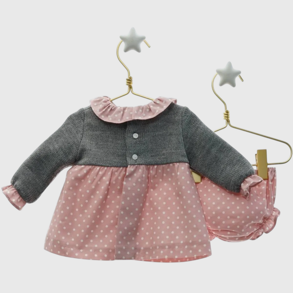Miniloo grey knit top with pink polka dot skirt and matching bloomers. Ruffled collar and cuffs.